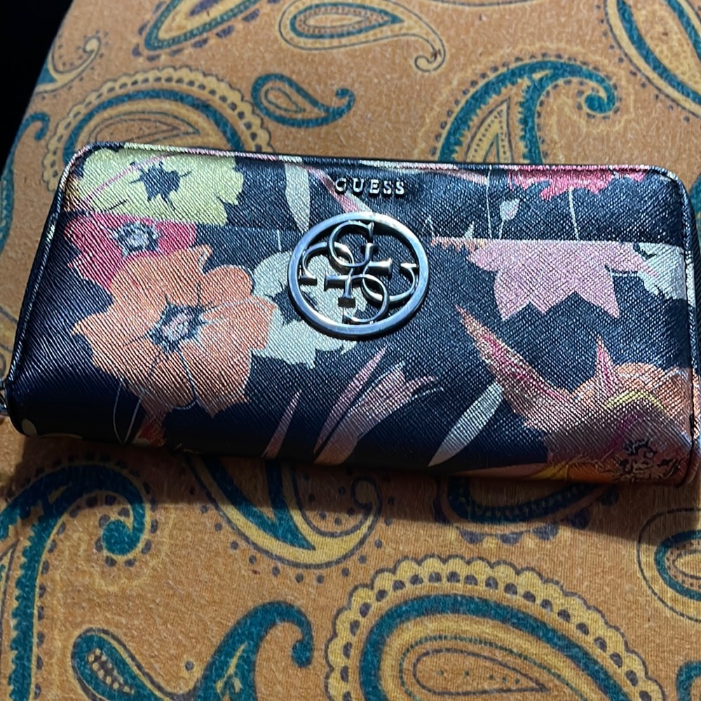 Guess zip around wallet wristlet used twice but still in condition multicolor